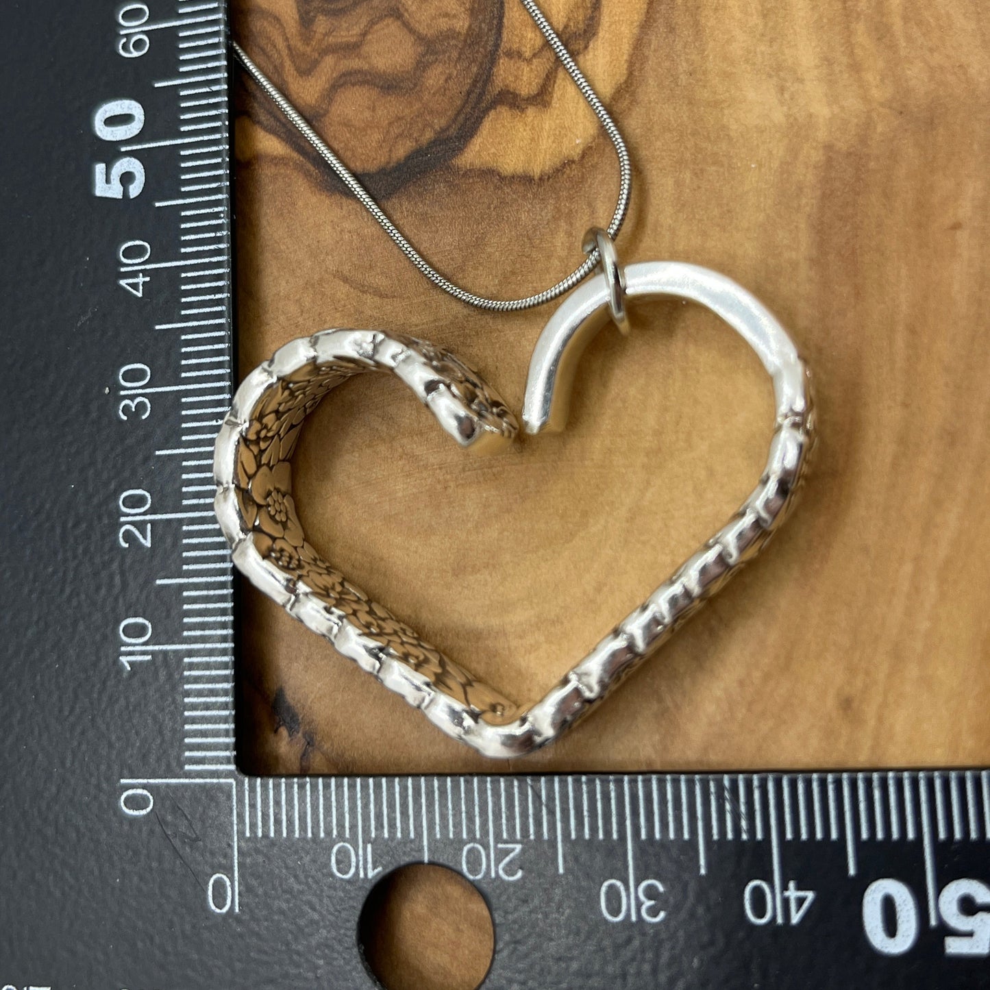 Heart Shaped Pendant made from rare Precious Flower pattern