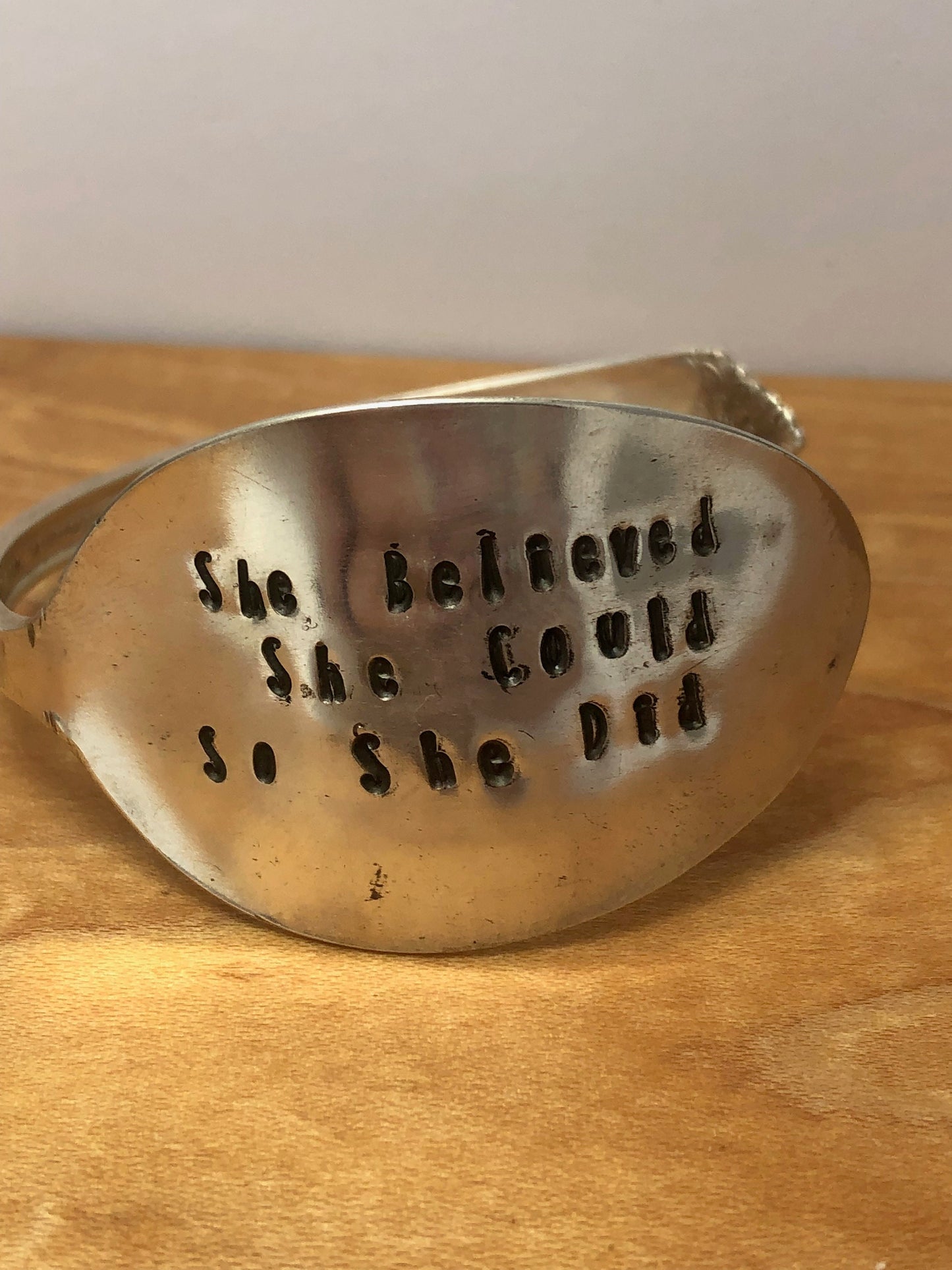 Silver Bracelet made from antique repurposed silver spoon with the saying "she wished she could so she did" hand stamped. Silverware Jewelry