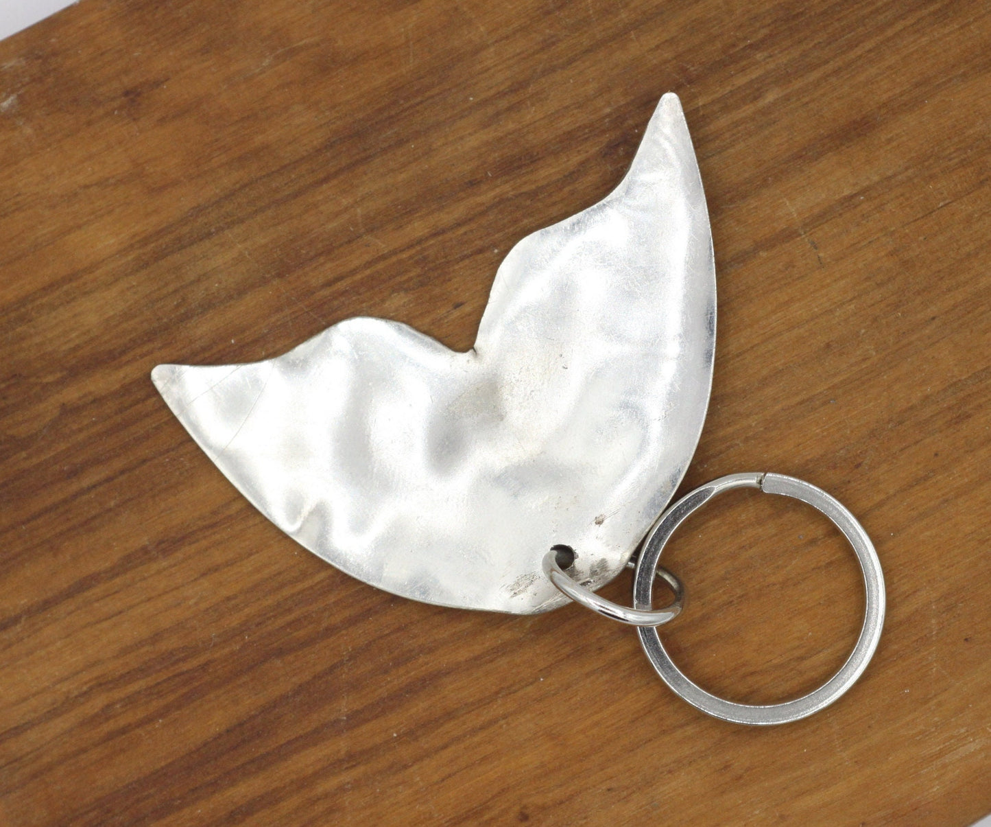 Metal Whale Tail Keychain made from Silver spoon bowl and hand cut into the shape of a whale tail, Silver Keychain, Whale Keychain
