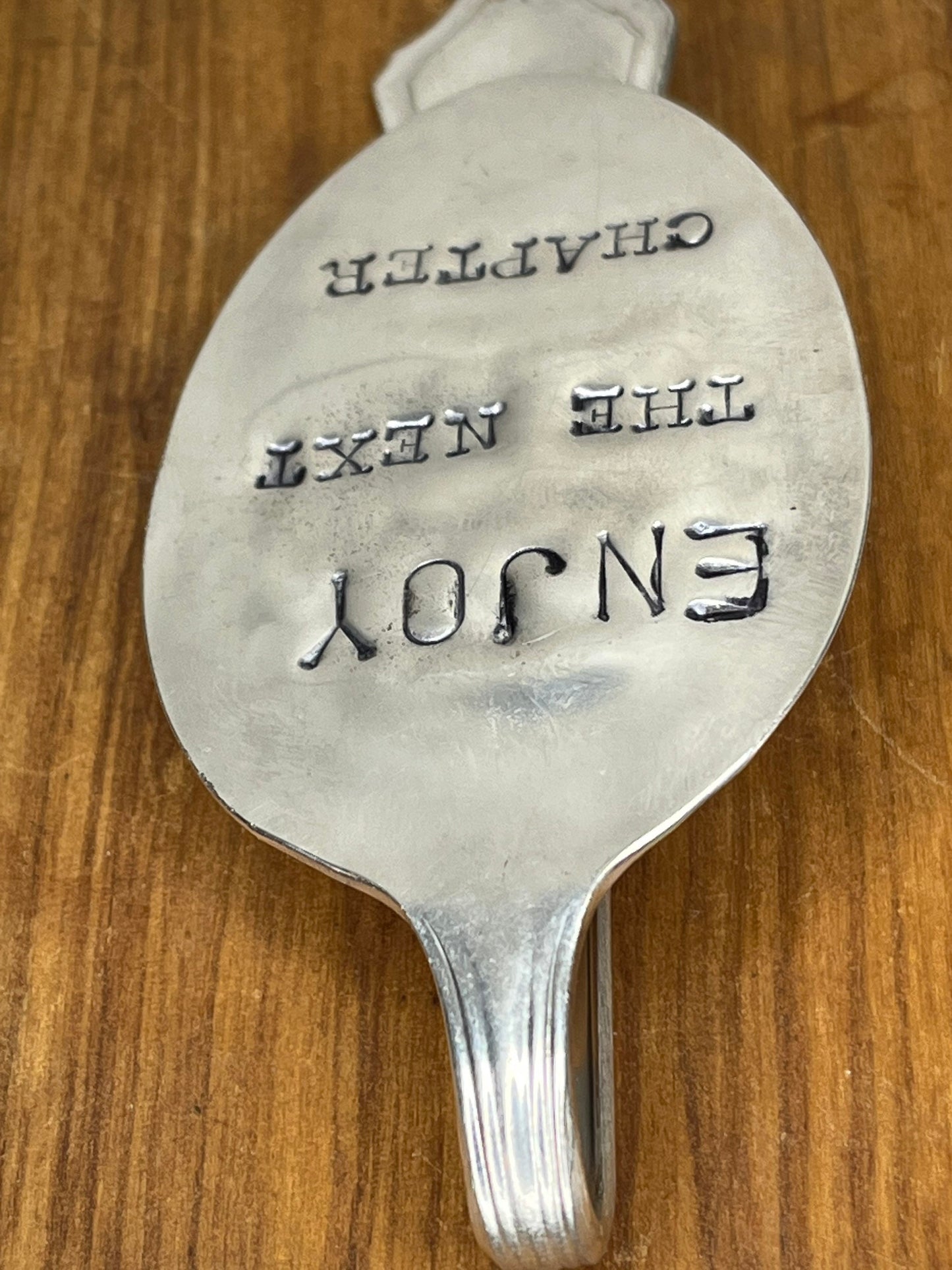 Silver Bookmark Made Hand Stamped “Enjoy the next chapter”