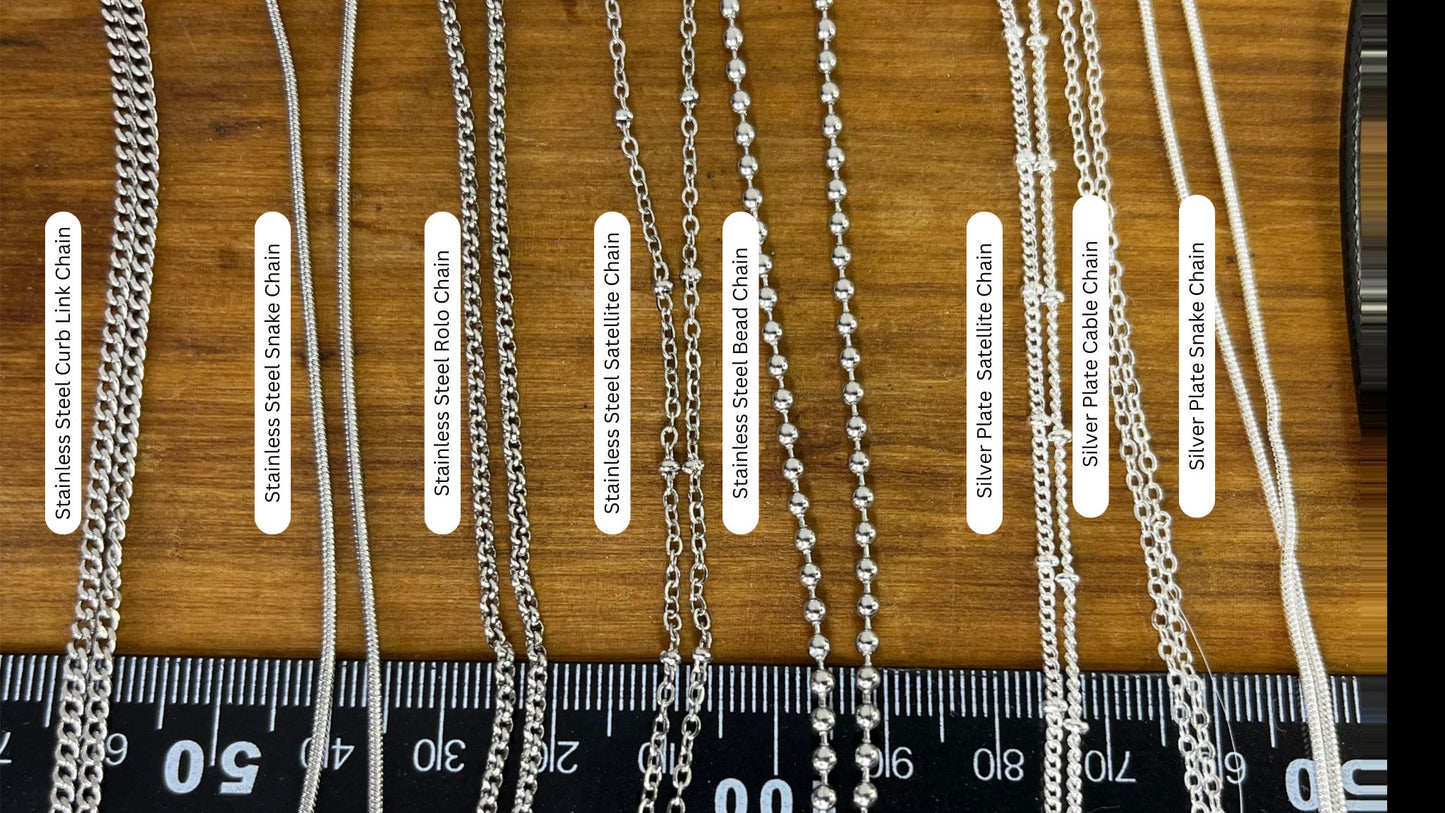 Hand Cut Silver Feather Pendant