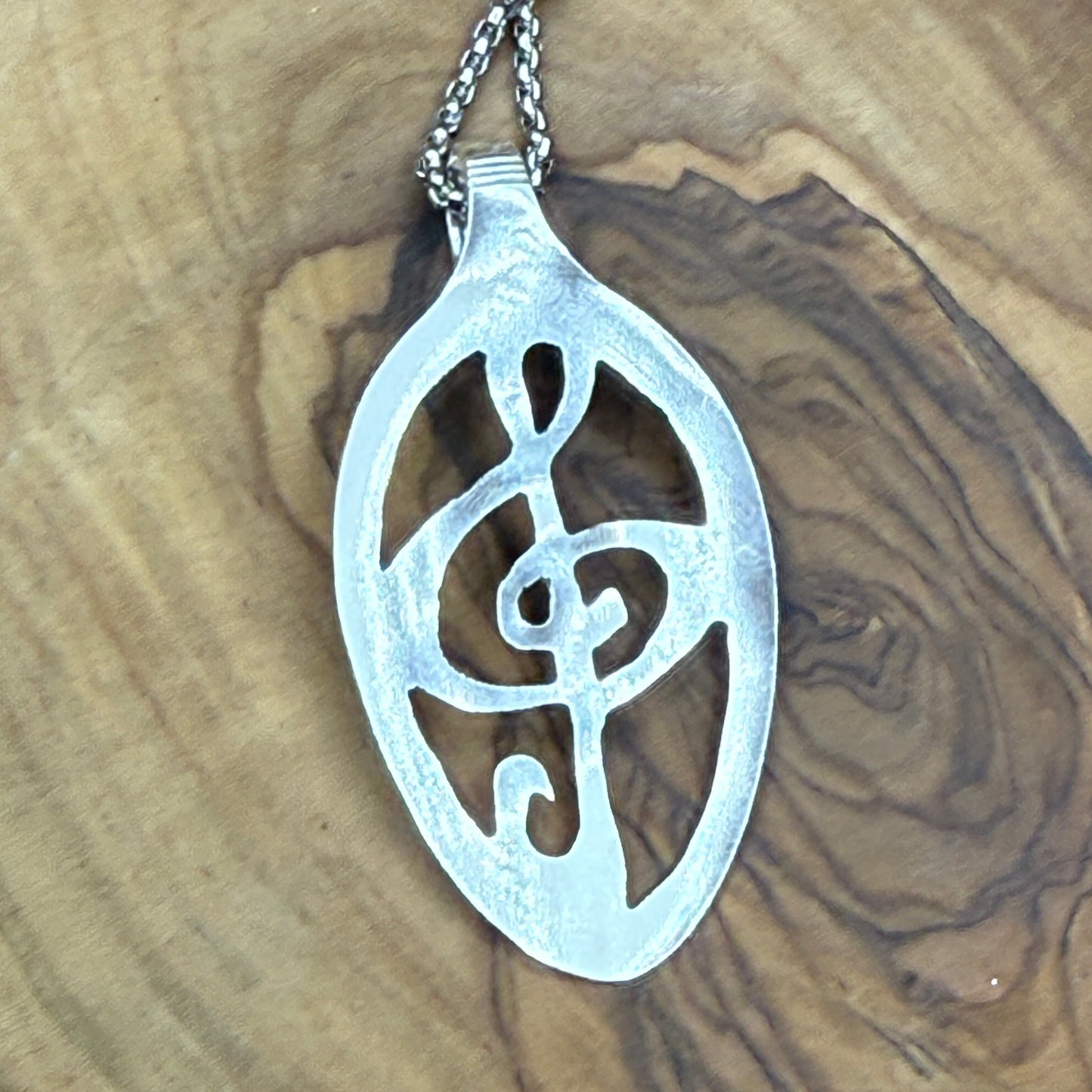 Hand cut Silver Treble Clef Pendant