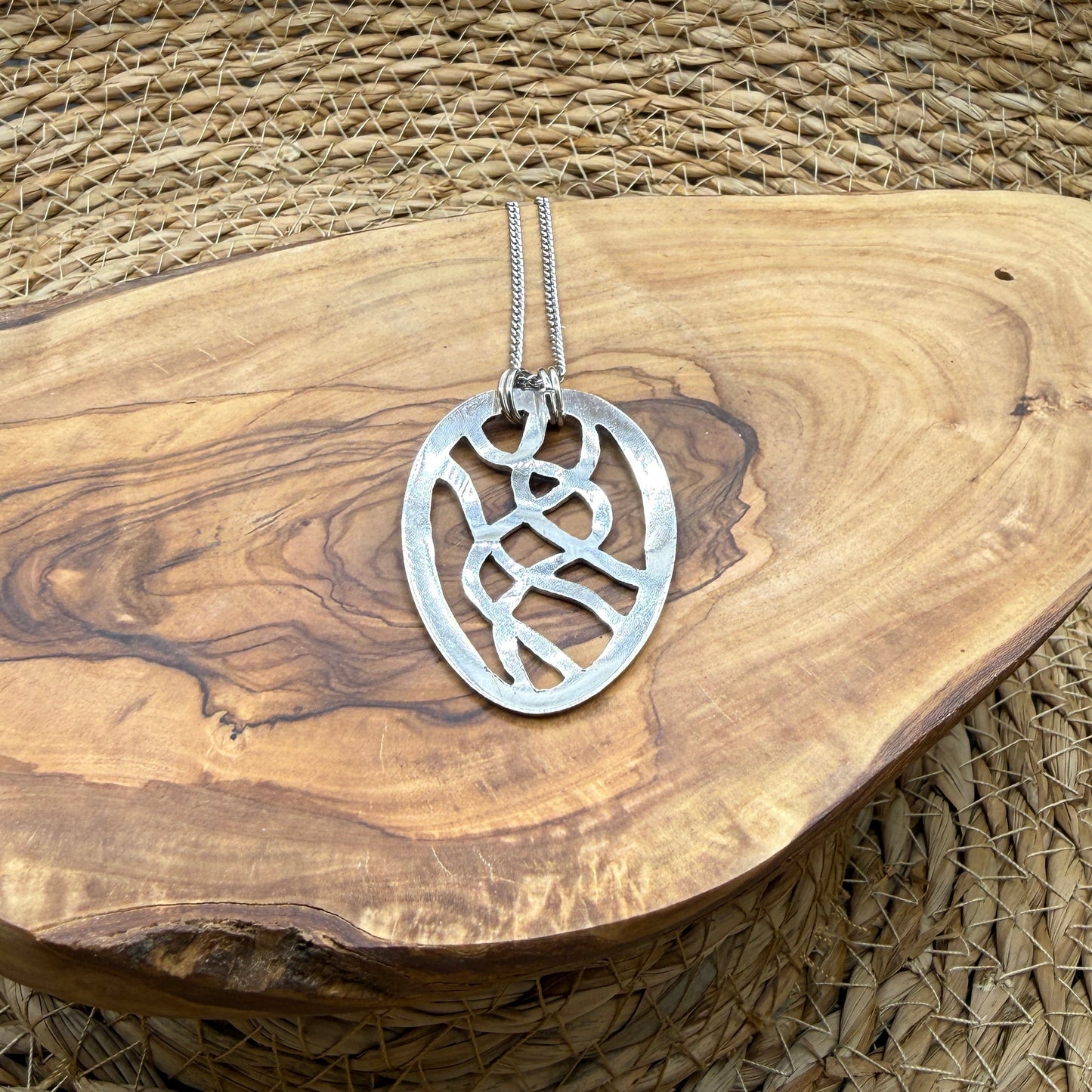 Hand cut Silver Abstract Pendant