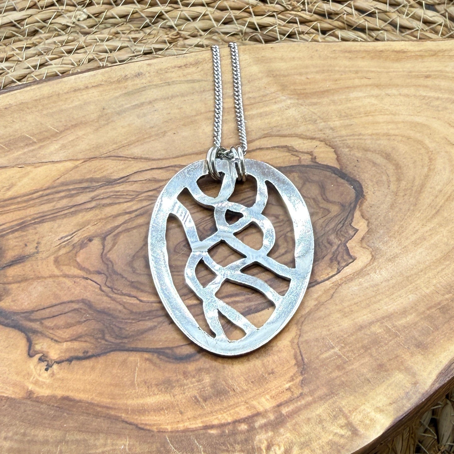 Hand cut Silver Abstract Pendant
