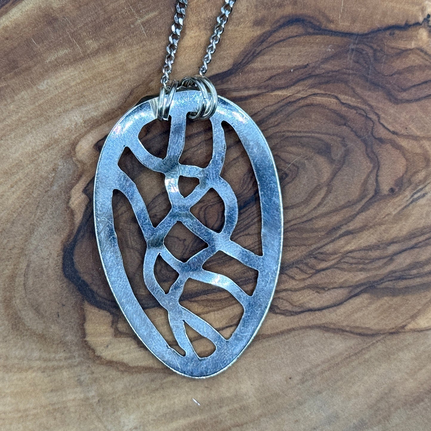 Hand cut Silver Abstract Pendant