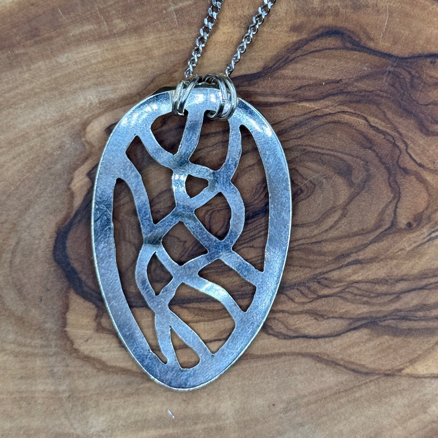 Hand cut Silver Abstract Pendant
