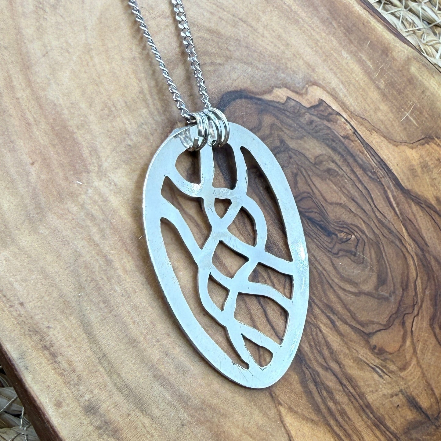 Hand cut Silver Abstract Pendant