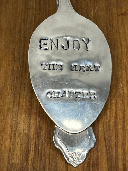 Custom Bookmark Made from Vintage/Antique Silverware Spoon with “Enjoy the next chapter” hand stamped.  Personalized bookmark